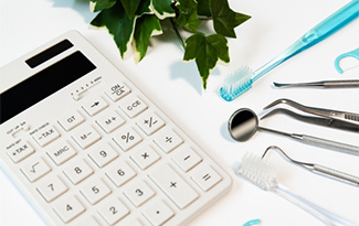 dental tools and calculator