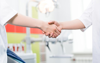 handshake in dental office