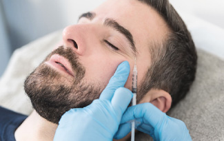 dentist holding 3D printed impression 