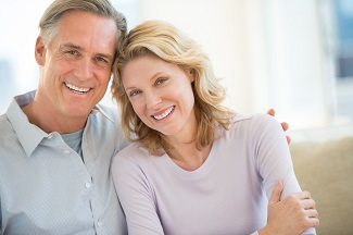 Middle age couple smiling