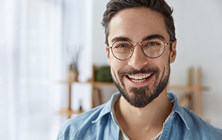 Young smiling man with dental implants in Lincoln