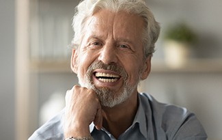 Man smiling with dentures