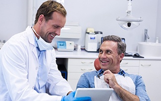 Man smiling at dentist