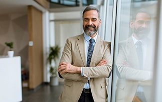 Man smiling at office