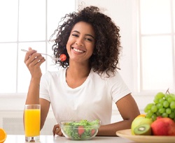 woman eating a salad