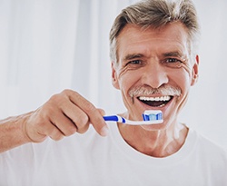 brushing teeth after getting dental implants in Lincoln