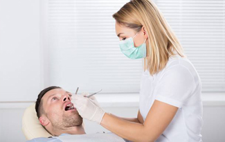 Man receiving dental treatment