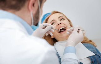 Woman receiving dental treatment