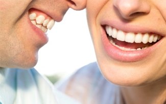 Man and woman smiling