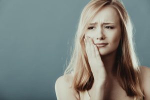 woman with jaw pain